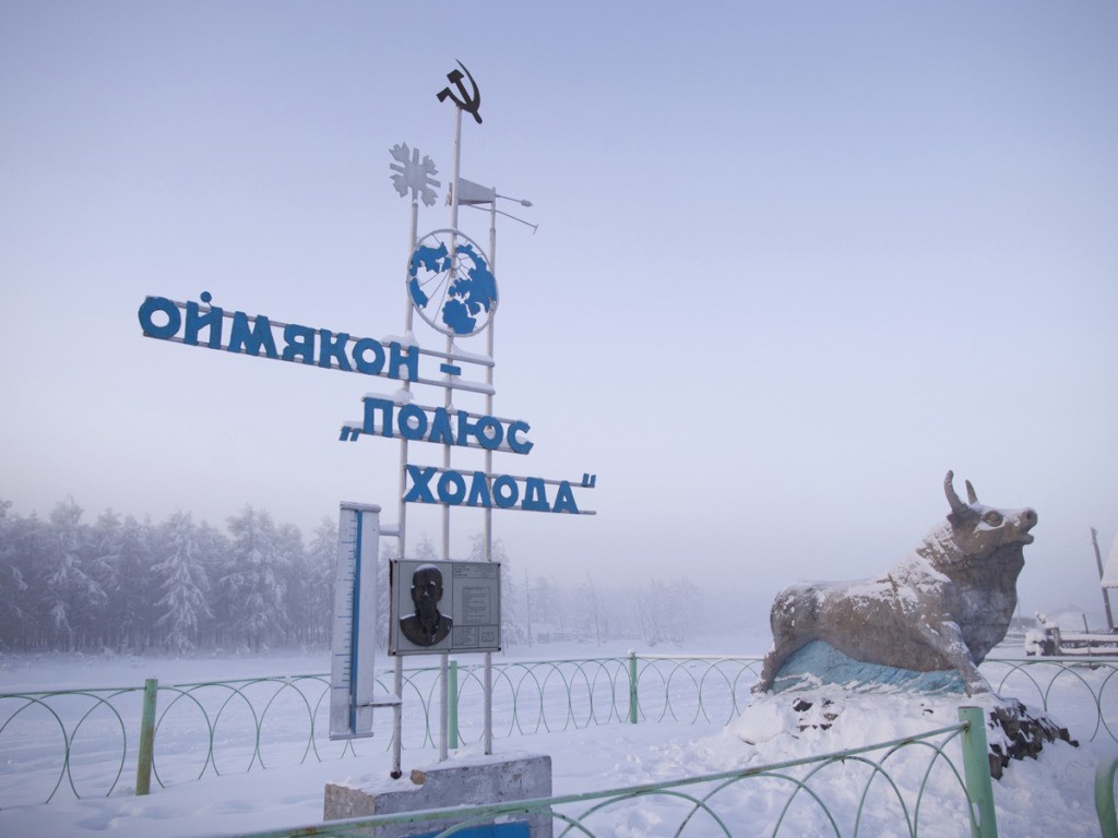 The communist-era monument marking the record-breaking temperature of -71.2 recorded in the village in 1924. The reads "Oymyakon, the Pole of Cold." Journey to Oymyakon, the coldest permanently inhabited settlement in the world. The village was originally a stopover for reindeer herders who would water their flocks from a thermal spring. Known as the "Pole of Cold" the town of 500 once recorded a temperature of -71.2. Average temperatures in January are -50c. PHOTO BY AMOS CHAPPLE / REX FEATURES **NORTH/SOUTH AMERICA OUT**